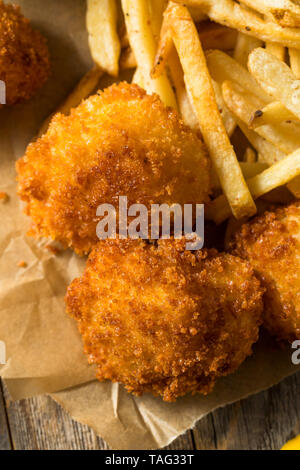 Homemade Deep Fried Scallops with French Fries Stock Photo - Alamy