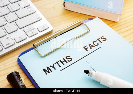 Myths and facts list with pen. Fake news concept. Stock Photo