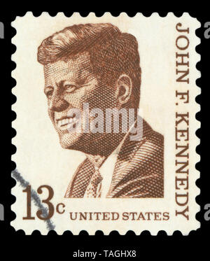 UNITED STATES OF AMERICA - CIRCA 1967: A used postage stamp printed in United States shows a portrait of the President John Fitzgerald Kennedy in brow.
