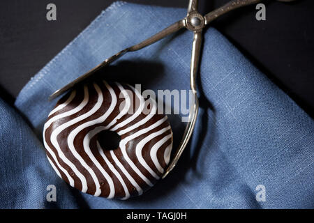 A donut on a brown background Stock Photo