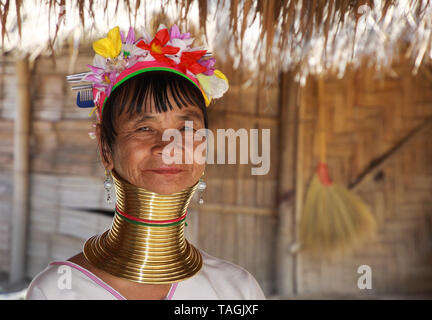 longneck karen village thailand december 17 2017 close up portrait of old long neck woman from padaung tribe wearing traditional brass neck ring