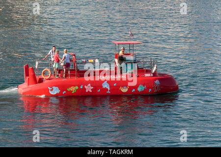 ZADAR, CROATIA - JULY 10, 2016: Red semi submarine for tourists in Zadar harbor Stock Photo