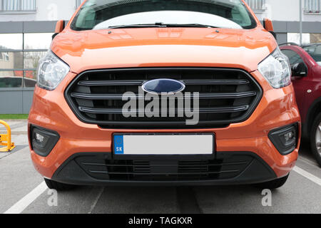 Empty License plate in the front of a orange car Stock Photo