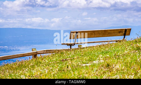 Wooden bench and vista point overlooking south San Francisco bay area and San Jose, California