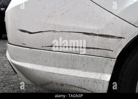 Scratches and black stains on cars Stock Photo