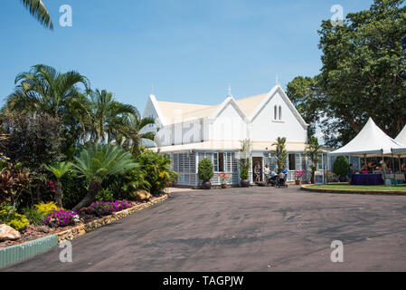 Darwin, Northern Territory, Australia-September 1,2018: Exterior of the Government House with garden and tourists in Darwin, Australia Stock Photo