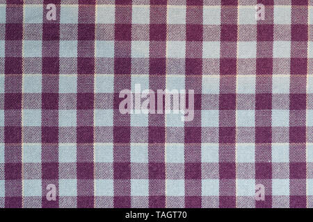 Full frame cotton check purple and blue fabric background Stock Photo