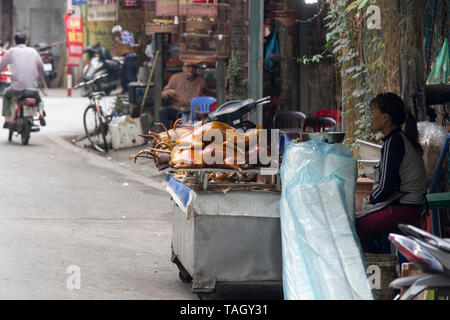 Hanoi, Vietnam - Januray 06, 2017: Selling and buying dog meat in Vietnam. Dog meat is one of the most interesting kinds of food and very popular in t Stock Photo