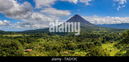 Panoramic view of Arenal Volcano and lake in central Costa Rica Stock Photo