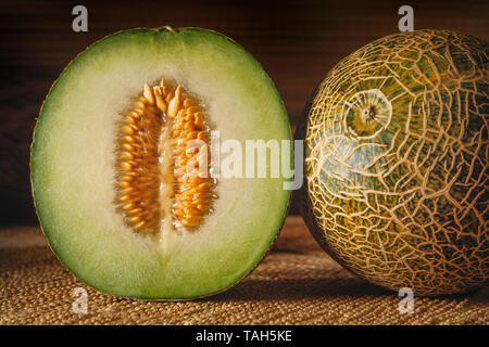 Galia melon, Cucumis melo, cut section showing flesh & seeds