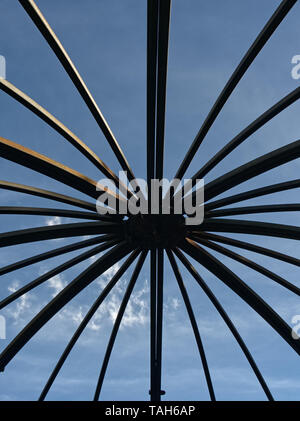 Abstract metal shape against a blue sky Stock Photo