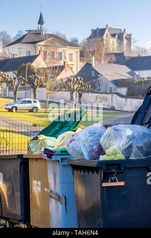 Overflowing public rubbish bins - France. Stock Photo