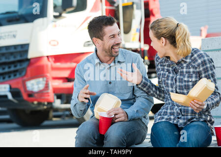 warehouse workers having lunch break Stock Photo