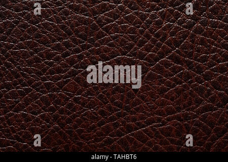 Contrast relief leatherette texture in dark tone. High resolution photo. Stock Photo