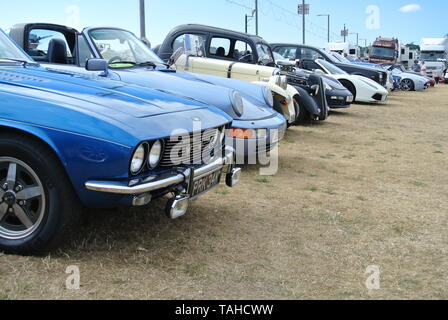 A Line of classic cars parked up on display at the Riviera classic