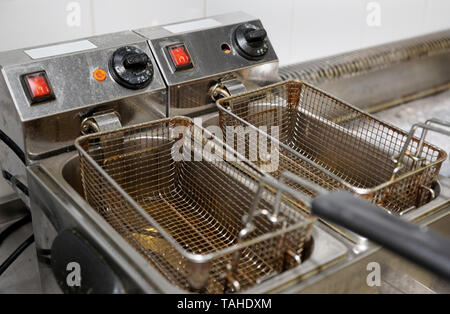 Deep Fryers With Boiling Oil Stock Photo - Download Image Now - Deep-fryer,  Cooking Oil, Restaurant - iStock