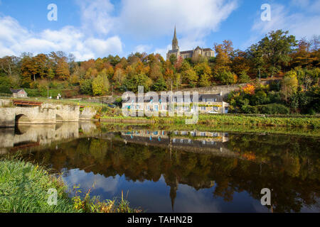 A view of Chateauneuf-du-Faou overlooking the canalized section of the Nantes Brest Canal in  River Aulne in Finistere Brittany France. Stock Photo