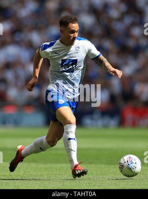 Tranmere Rovers' Kieron Morris battle for the ball during the Sky Bet League Two Play-off final at Wembley Stadium, London. Stock Photo