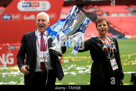 Tranmere Rovers executive chairman Mark Palios (left) with wife, vice-chairman Nicola Palios celebrate with the trophy after the Sky Bet League Two Play-off final at Wembley Stadium, London. Stock Photo