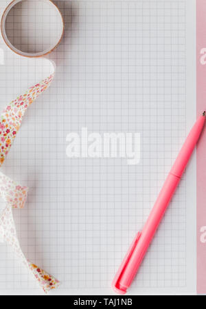 Back to school. Notebook, pencil case with pen and pencils on pink background. Stock Photo
