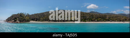 Panorama of Wineglass Bay, Freycinet National Park, Beach, sky and Clouds with Turquoise Sea Stock Photo