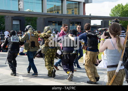 London, UK. 25th May, 2019. Comic Con fans on the second day of MCM London Comic Con event which is being held in London's Excel Arena. Claire Doherty/Alamy Live News Stock Photo