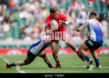LONDON, UK. 25th, May 2019. Adam Zaruba of Canada 7S is tackled during HSBC World Rugby Sevens Series London match between Team Canada 7S and Team Japan 7S at Twickenham Stadium on Saturday, 25 May 2019. LONDON England .  (Editorial use only, license required for commercial use. No use in betting, games or a single club/league/player publications.) Credit: Taka G Wu/Alamy Live News Stock Photo