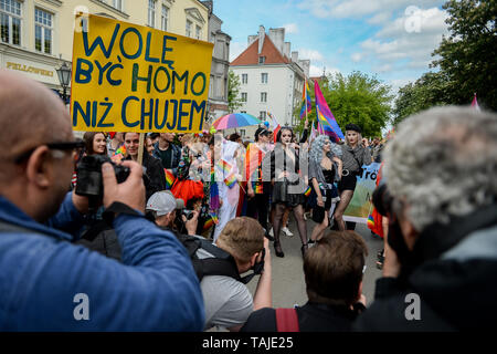 LGBT participants seen posing for cameras during the march. Several thousands of people took part in the annual 5th Tricity Equality March manifesting LGBT rights, it was organized by the, 'Tolerado', and under the slogan 'Love can only connect'. Different Counter protesters were seen during the event. Stock Photo