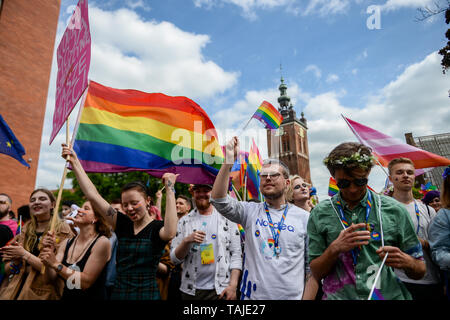 People seen with flags and LGBT signs during the march. Several thousands of people took part in the annual 5th Tricity Equality March manifesting LGBT rights, it was organized by the, 'Tolerado', and under the slogan 'Love can only connect'. Different Counter protesters were seen during the event. Stock Photo