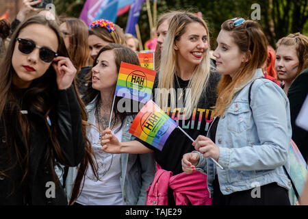 Women seen with LGBT flags during the march. Several thousands of people took part in the annual 5th Tricity Equality March manifesting LGBT rights, it was organized by the, 'Tolerado', and under the slogan 'Love can only connect'. Different Counter protesters were seen during the event. Stock Photo