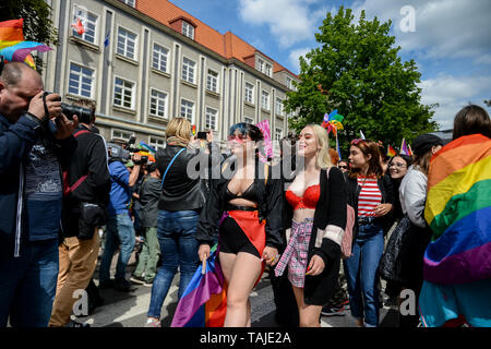 LGBT participants seen during the march. Several thousands of people took part in the annual 5th Tricity Equality March manifesting LGBT rights, it was organized by the, 'Tolerado', and under the slogan 'Love can only connect'. Different Counter protesters were seen during the event. Stock Photo