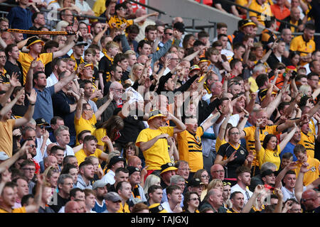 London, UK. 25th May, 2019. Newport county fans. Skybet football league two play off final, Newport County v Tranmere Rovers at Wembley Stadium in London on Saturday 25th May 2019.  this image may only be used for Editorial purposes. Editorial use only, license required for commercial use. No use in betting, games or a single club/league/player publications . Credit: Andrew Orchard sports photography/Alamy Live News Stock Photo