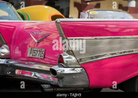 Havana, Cuba - Taxis wait for fares near Hotel Parque Central and Hotel Plaza. Classic American cars from the 1950s, imported before the U.S. embargo, Stock Photo