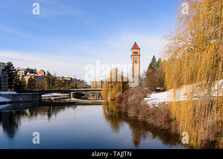 Morning Views of the Spokane River flowing in front of the Spokane Opera House and Convention Center in Riverfront Park Spokane Washington USA Stock Photo