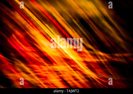 Colorful soft circular bokeh overlay for use to enhance images with copy space on a deep twilight blue background Stock Photo