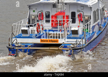 LONDON GREENWICH MBNA THAMES STORM CLIPPER  ON THE RIVER AND SPRAY FROM THE POWER OF THE ENGINES Stock Photo