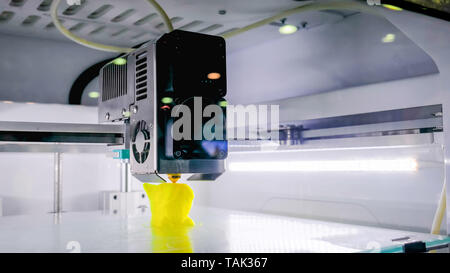 Automatic three dimensional 3D printer machine printing plastic model Stock Photo