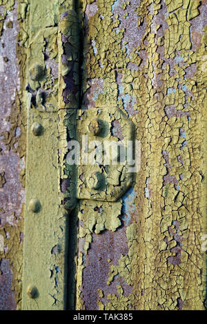 flaked paint on a steel door Stock Photo