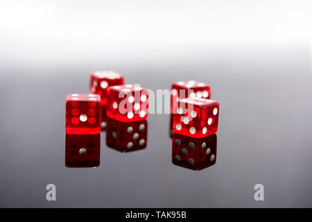 Red dice on transparent black background Stock Photo