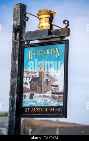 The sign outside the Harbour Inn pub at Porthleven in Cornwall, England, UK Stock Photo