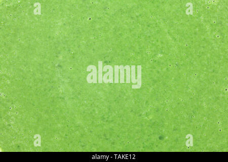 Closeup of spinach soup, detail bubbles on green liquid. Healthy leaves vegetables food concept Stock Photo
