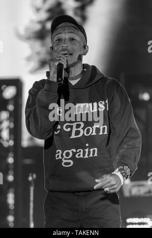 LOS ANGELES, CA - DECEMBER 4, 2014: Singer/songwriter Pharrell Williams  with wife & son & family on Hollywood Boulevard where he was honored with  the 2,537th star on the Hollywood Walk of