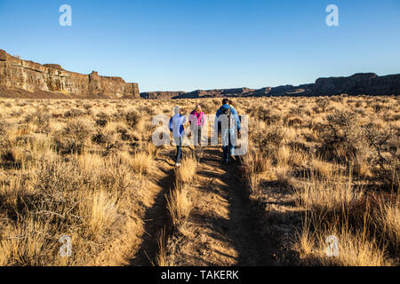 A group of day hikers on the Ancient Lakes Trail in Eastern Washington, USA. Stock Photo