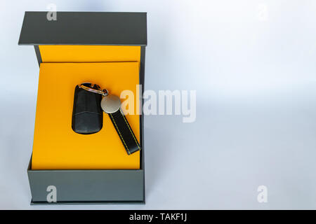 New car key in the original box on white background Stock Photo