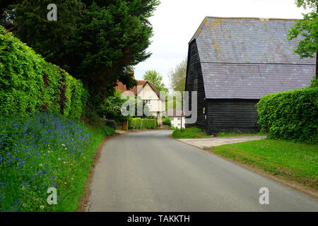 A view down the Street past the Great Barn, Manor Farm, Wallington Stock Photo