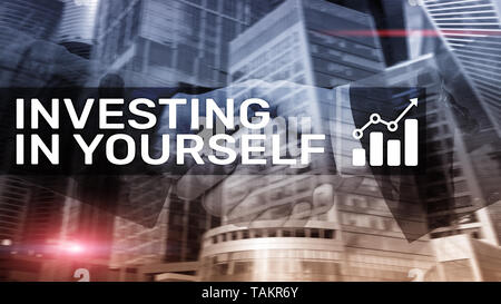 Invest in yourself. Personal development and education concept on abstract blurred background. Stock Photo