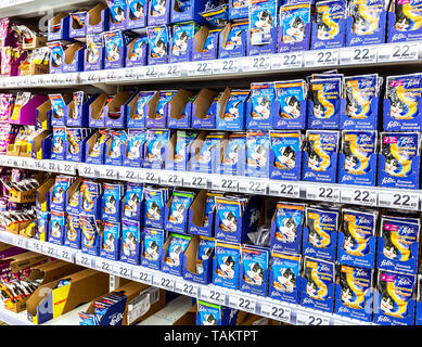 Samara, Russia - May 26, 2019: Various fresh cat food ready for sale on supermarket shelves. Cat food as background Stock Photo