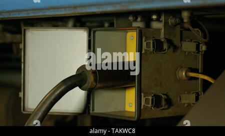 Electro panel board. High voltage. Electrical mechanism with cable close up. Stock Photo
