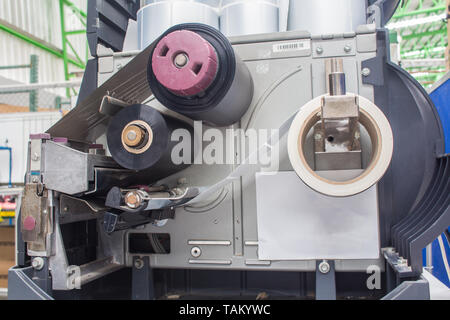 Barcode printer and barcode label with ribbon technology printer. Stock Photo