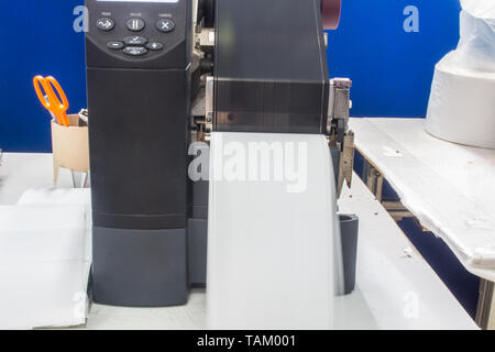 Barcode printer and barcode label with ribbon technology printer. Stock Photo